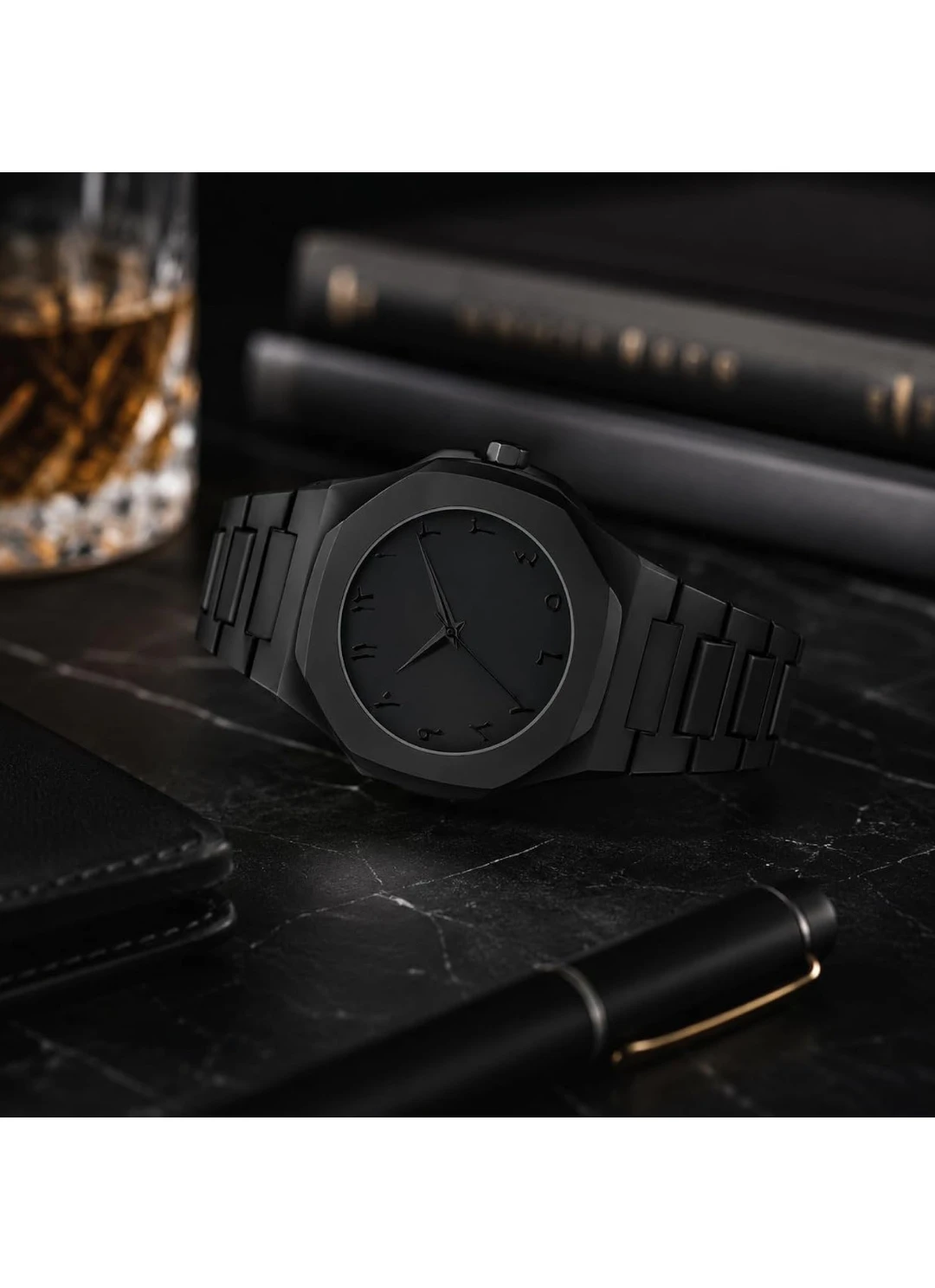 All-black analog wrist watch with geometric case, Arabic numeral dial and matching link strap