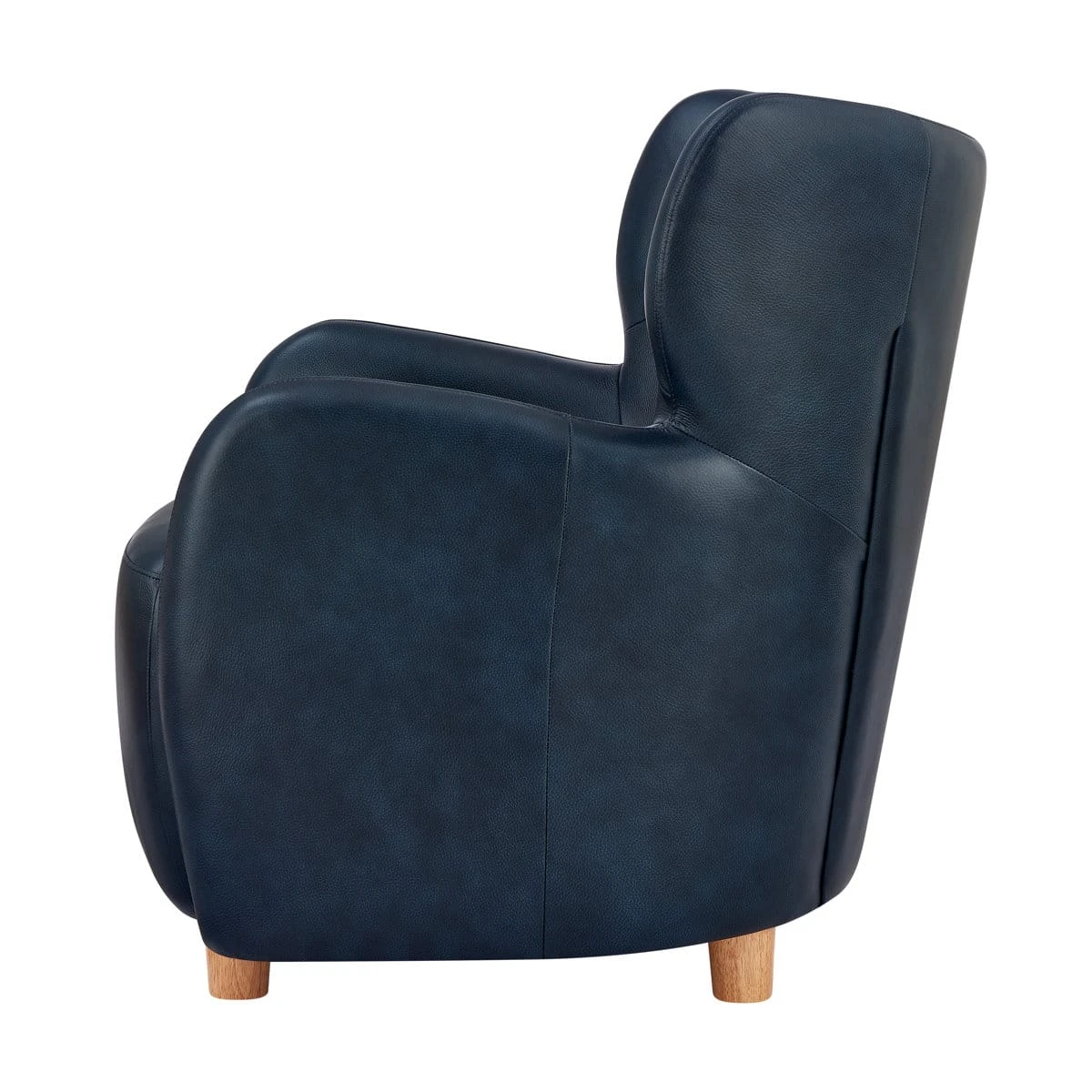 Side profile showing the sculpted backrest, curved arm shape, and tapered wooden legs