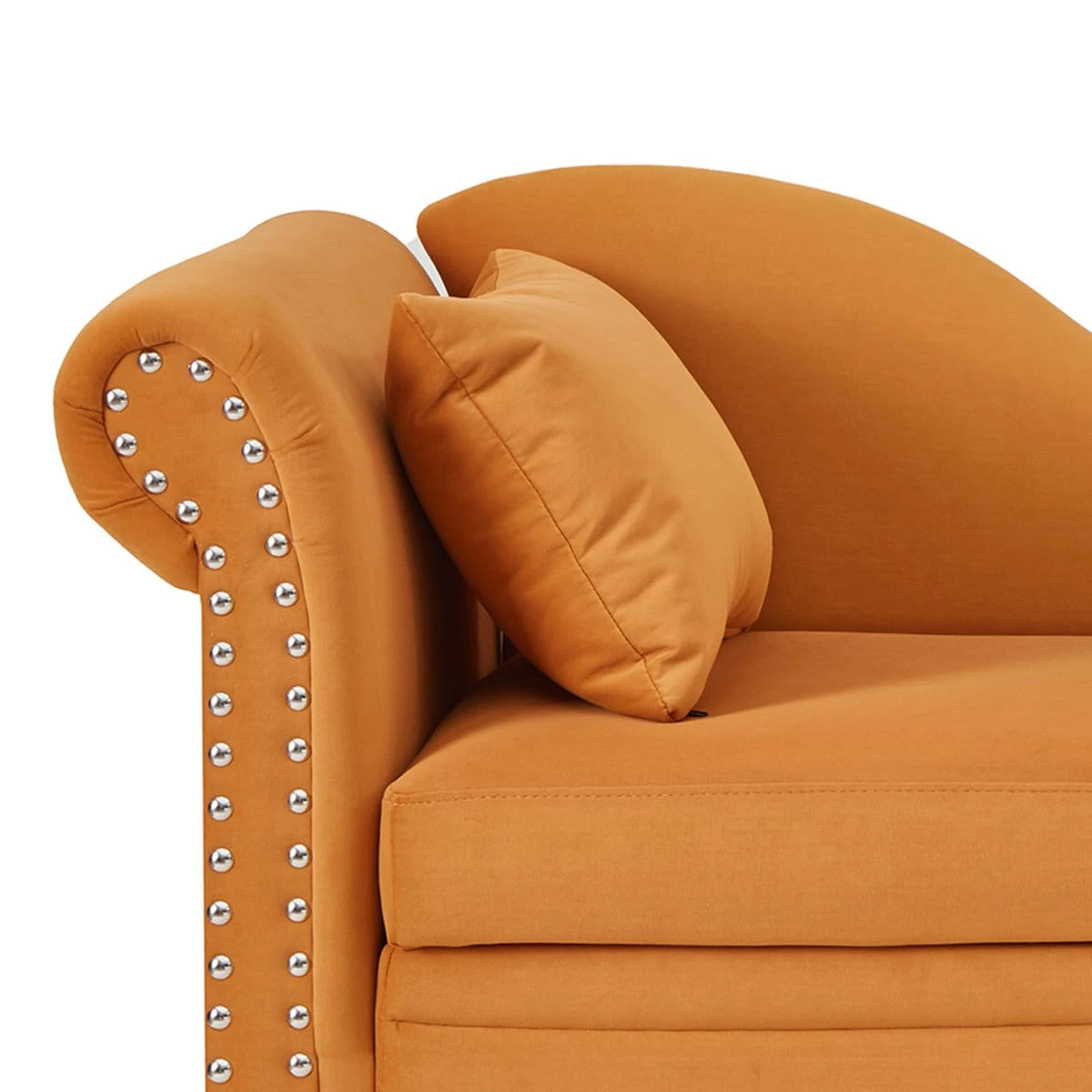 Close-up of the rolled arm, silver nailhead trim, seat cushion and matching pillow in mustard velvet