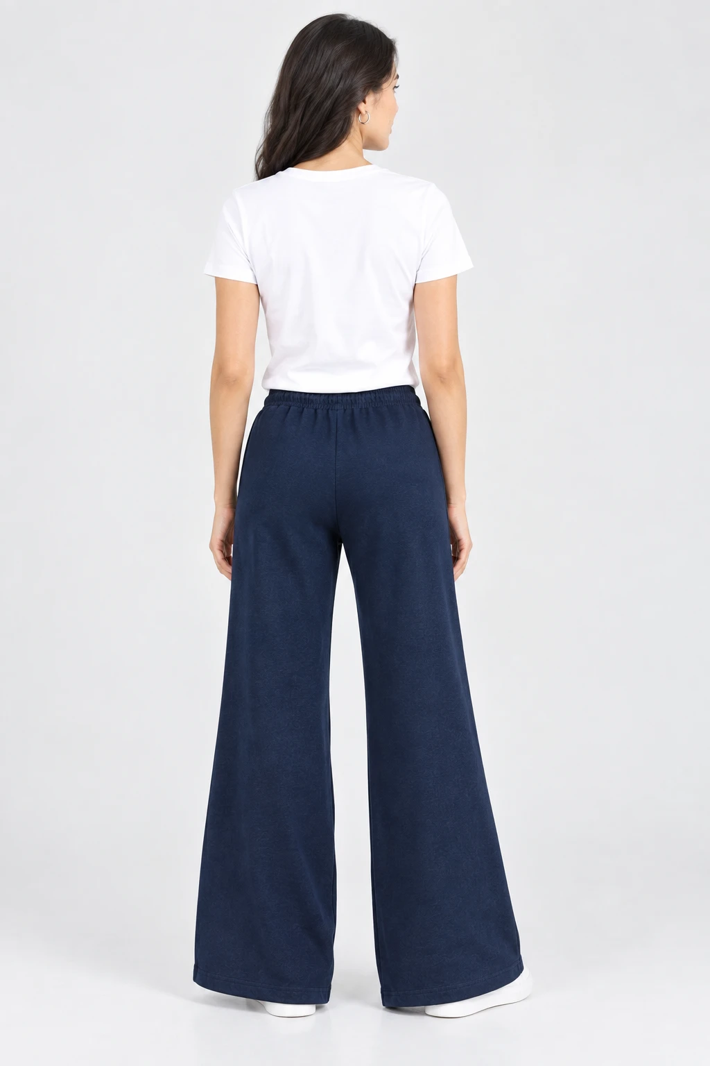 Back view of navy lounge pants showing wide straight legs and elastic waistband