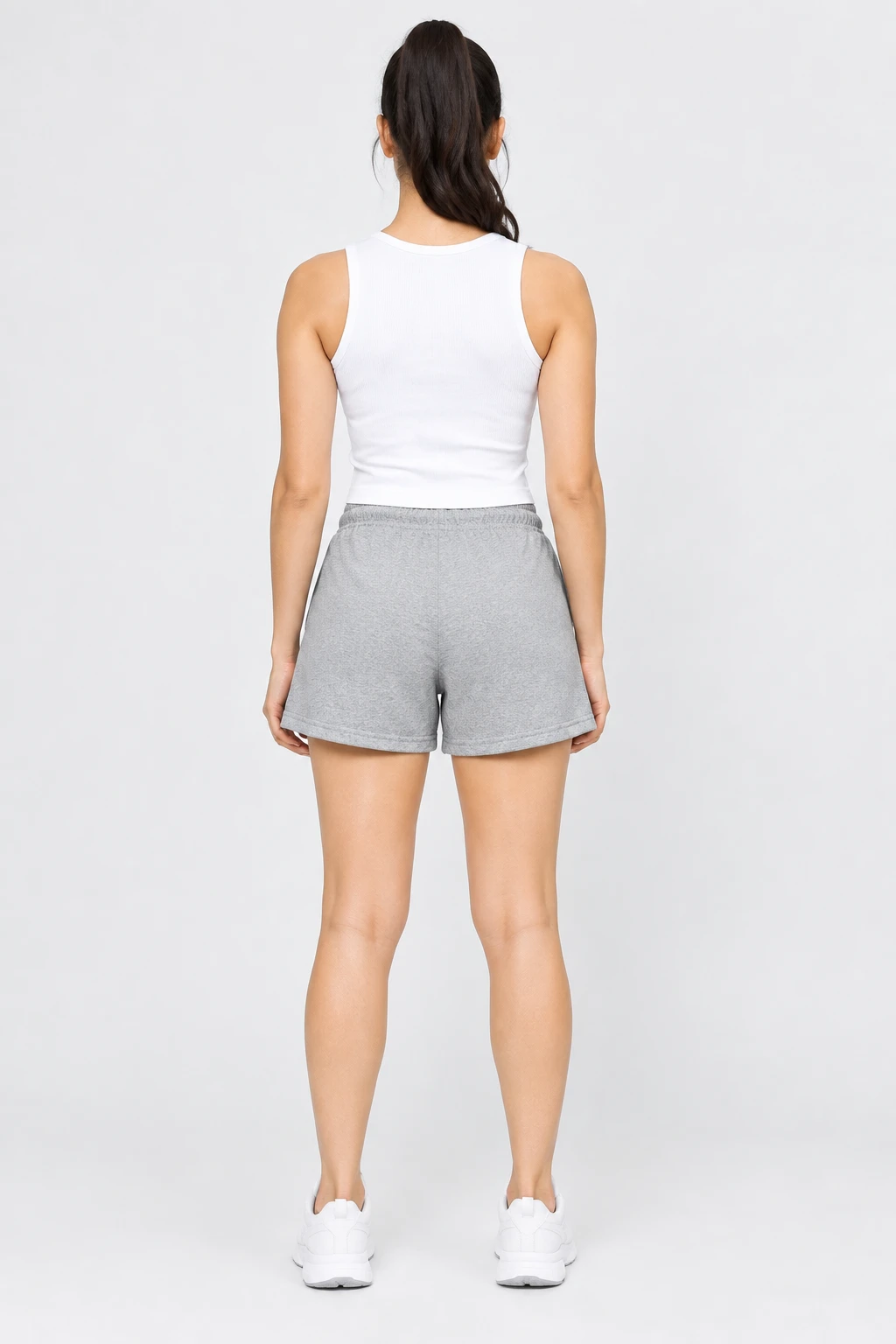 Back view of grey melange shorts showing elastic waistband and relaxed leg openings