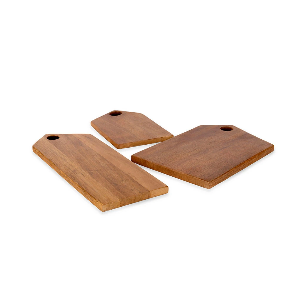 Angled tabletop view of the three wooden boards laid flat, highlighting thickness and hanging holes