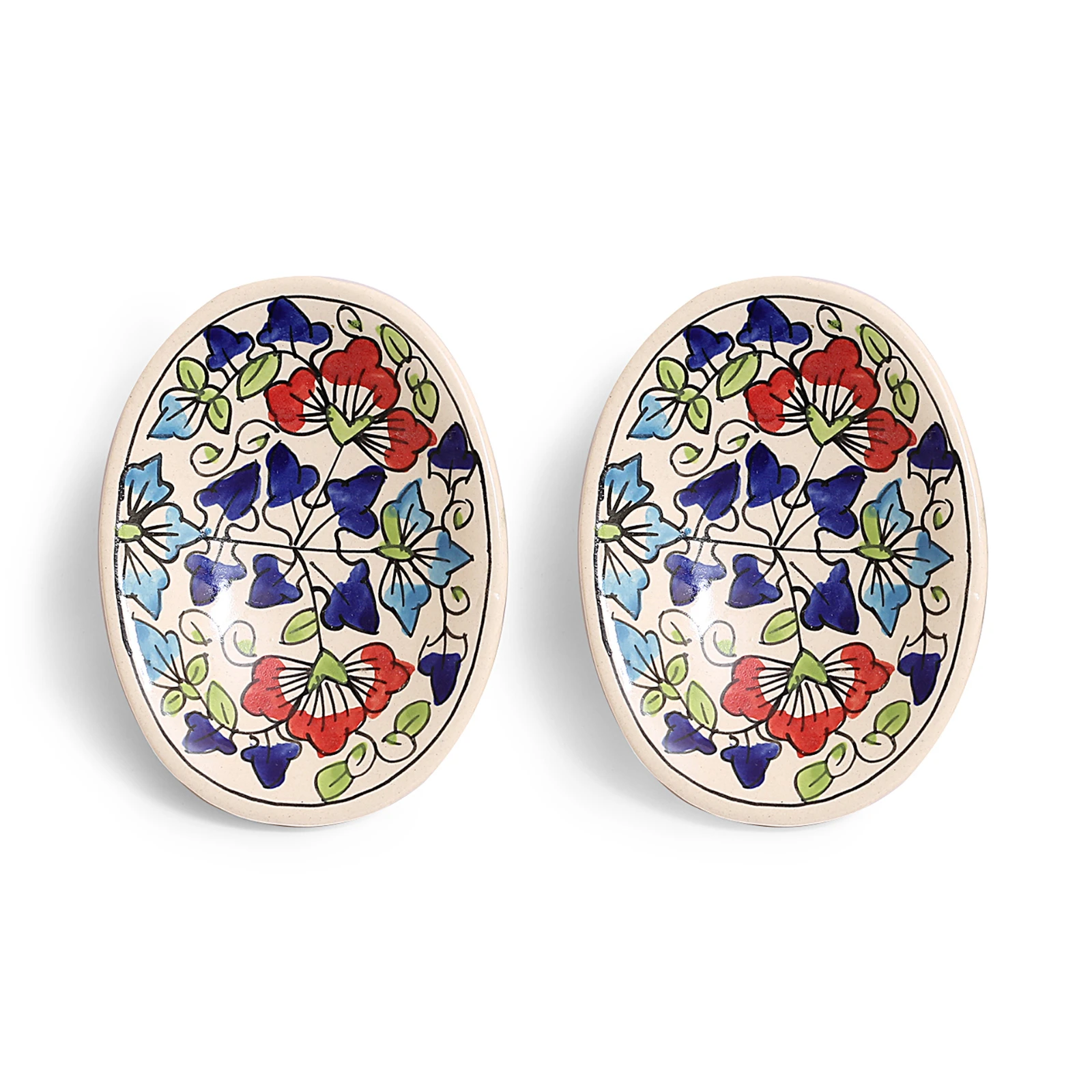 Top view of both spoon rests highlighting the colorful blue, red and green floral pattern