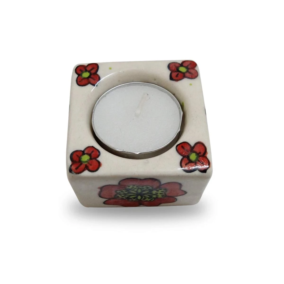 Single cube tealight holder with inserted white tealight, cream glaze and red corner flowers