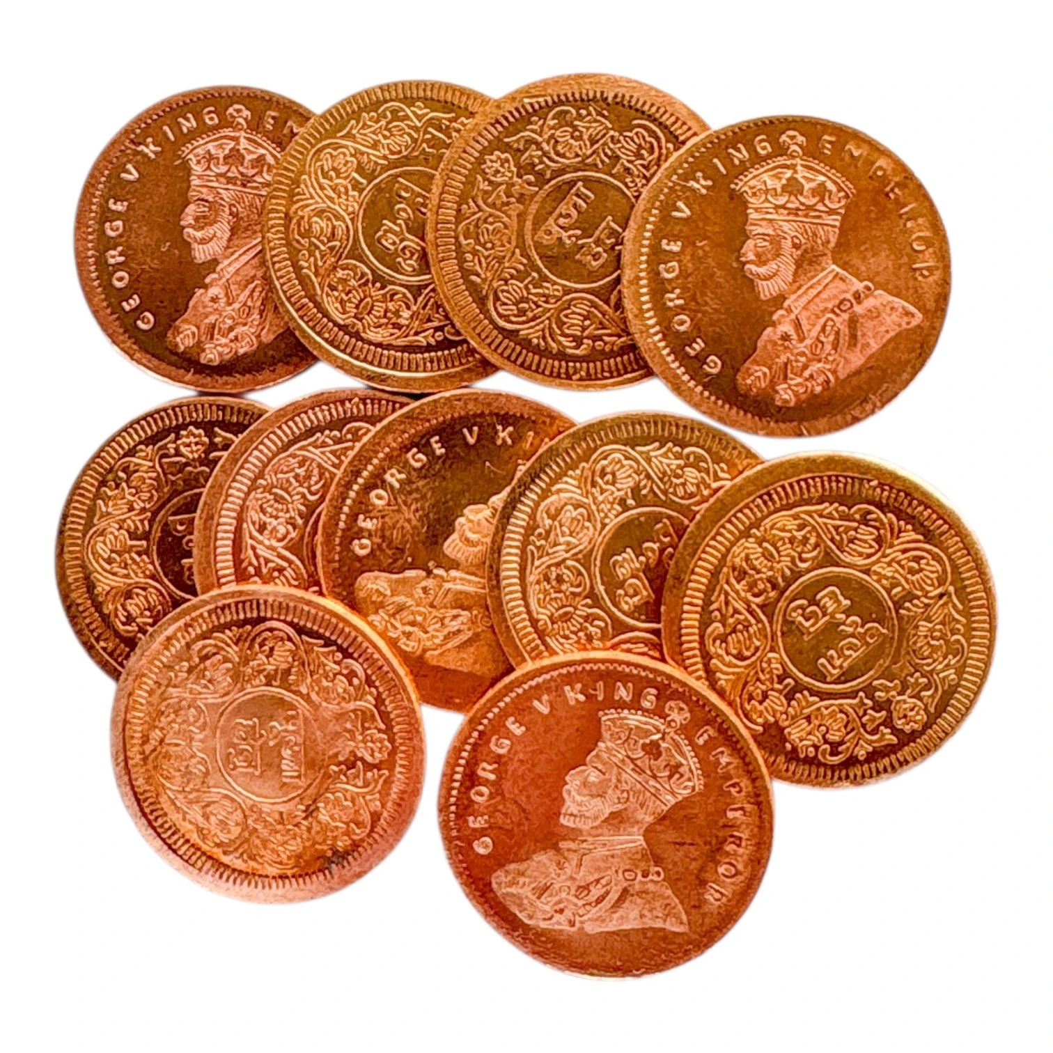 11 copper coins spread out, showing and ornate floral reverse designs