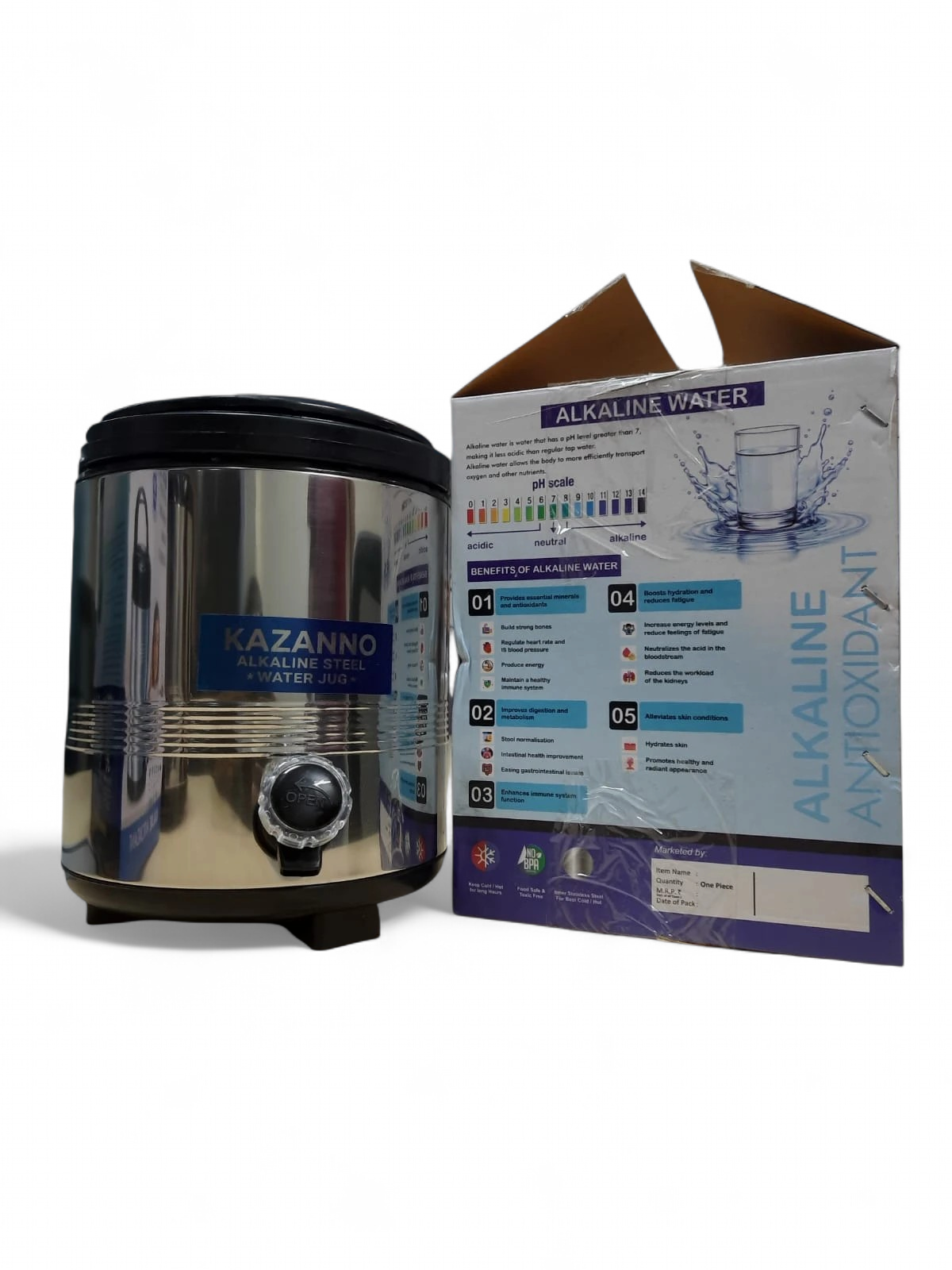 Jug next to side panel of box showing alkaline water pH scale and listed benefits