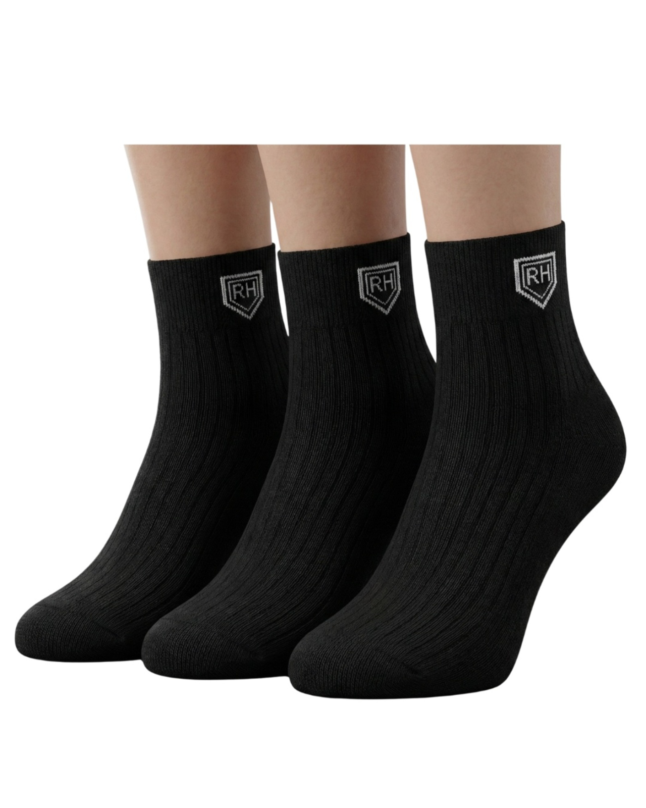 Three black ribbed ankle socks worn together, showing white RH shield logos on the cuffs