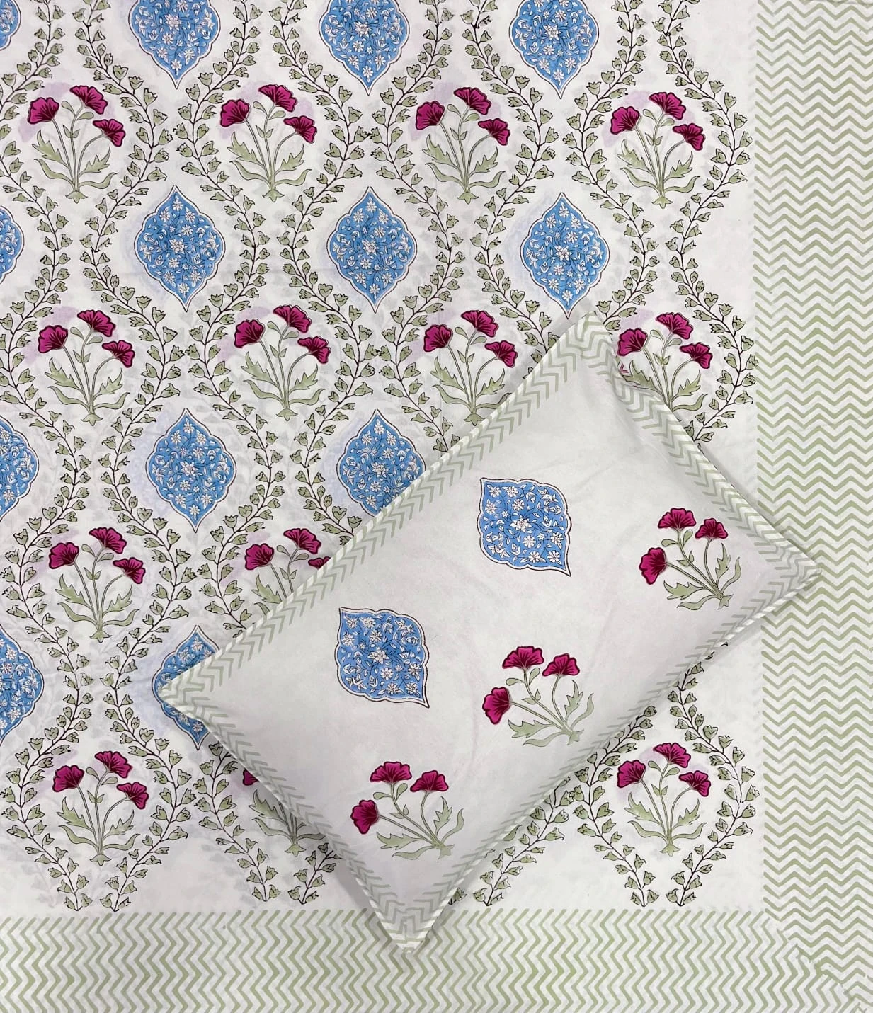 magenta bedsheet, blue medallion