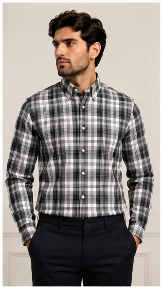Front view of a men's grey and black plaid button-down shirt styled with navy trousers