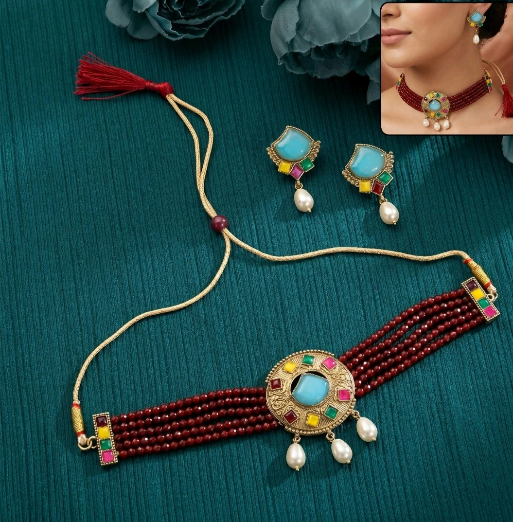 Flat lay of maroon beaded choker with adjustable cord, inset showing necklace and earrings worn on model