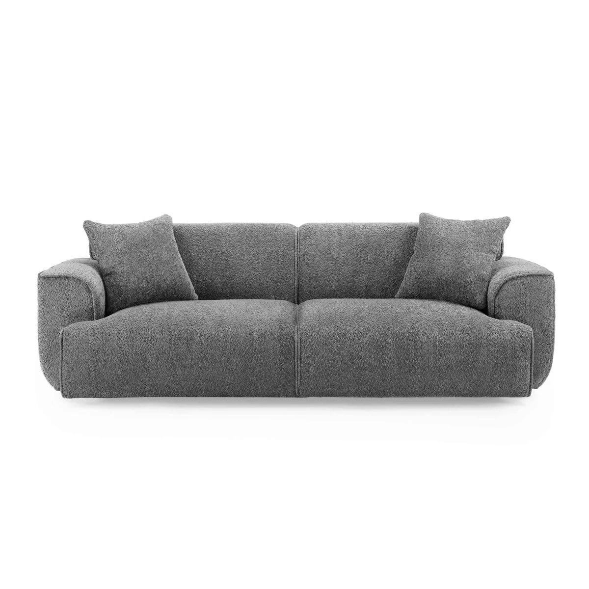 Front view of the grey 3 seater sofa with two pillows and low black legs