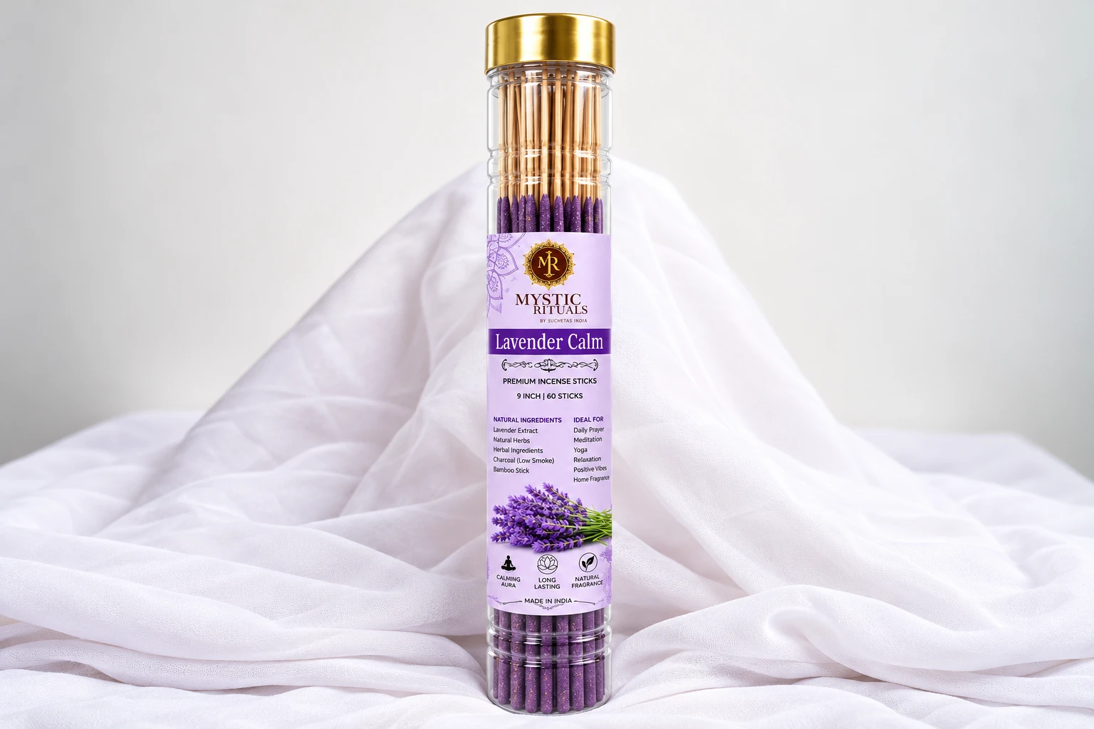 Lavender Calm incense stick tube with gold cap and lavender bouquet label, centered upright on white draped fabric