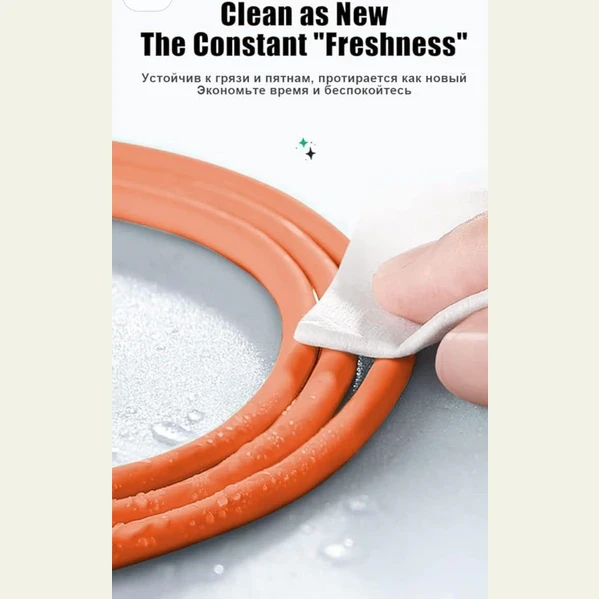 Orange cable being wiped clean with cloth, highlighting stain-resistant outer surface