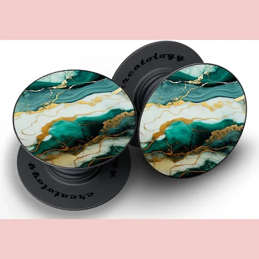 Two black collapsible phone grips with teal, white and gold marble pattern shown expanded