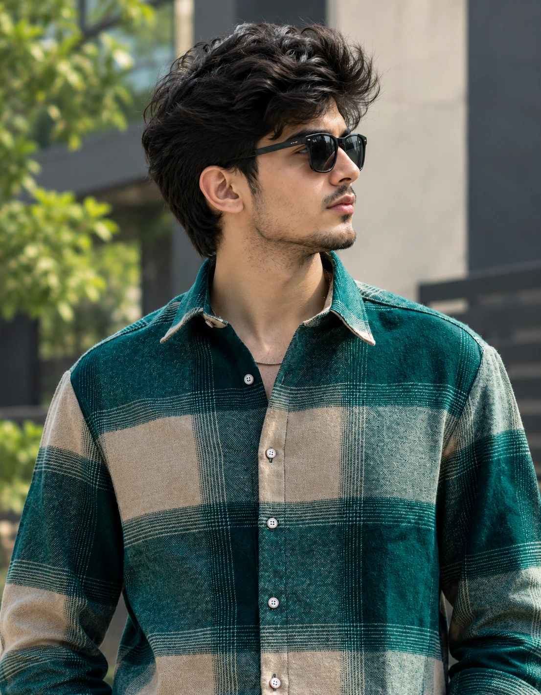 Upper-body close-up showing spread collar, button placket and checked pattern detail