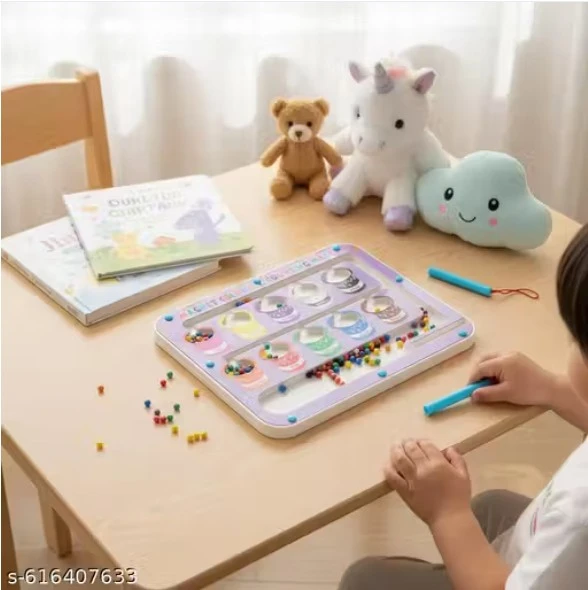 Child using the pastel purple counting maze on a table, with books and plush toys in the background