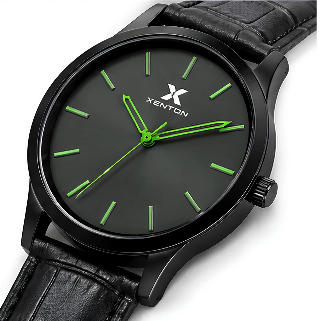 Close-up of the dial and right-side crown highlighting the black case and green hour markers