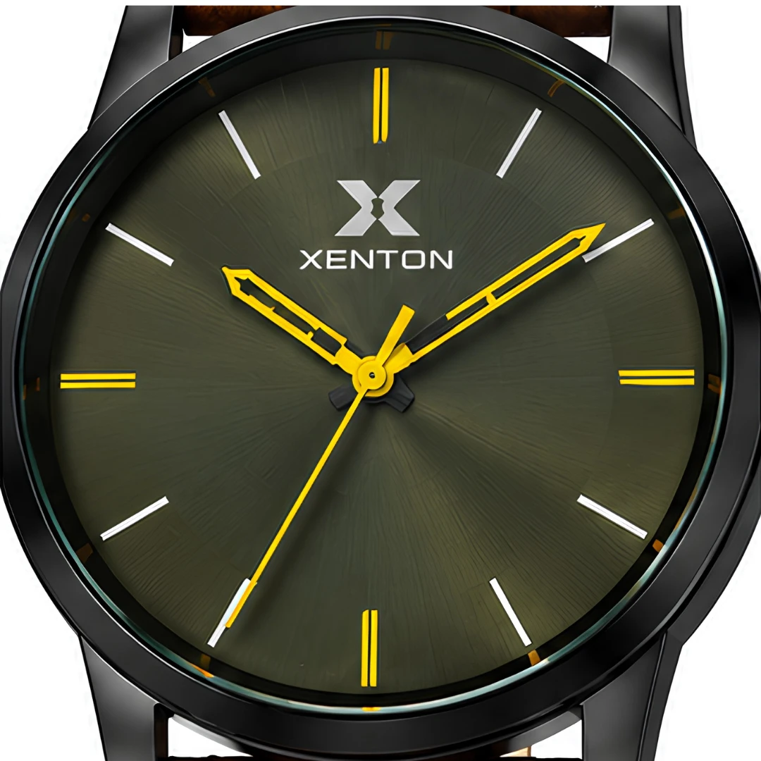 Close-up of the olive sunburst dial with yellow hands and minimalist hour markers