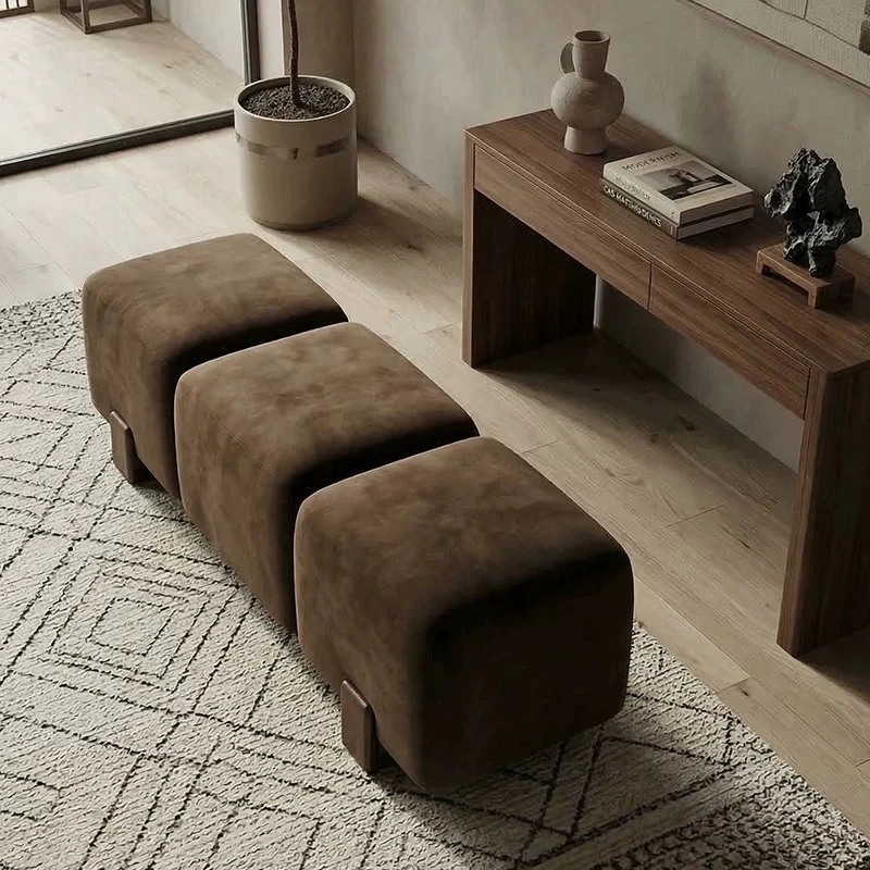 Same 3-seater velvet bench shown in brown