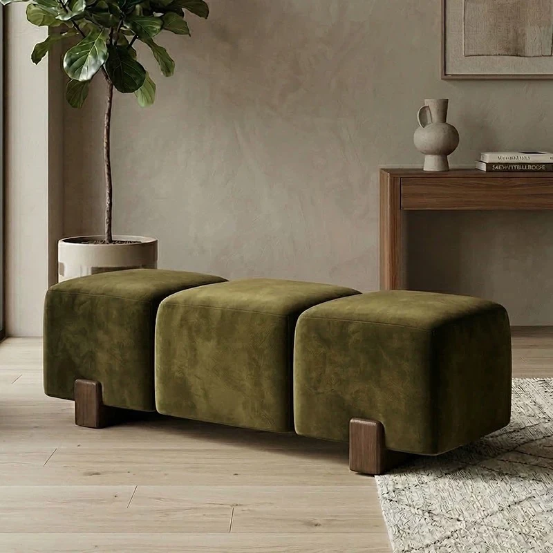 Same 3-seater velvet bench shown in green