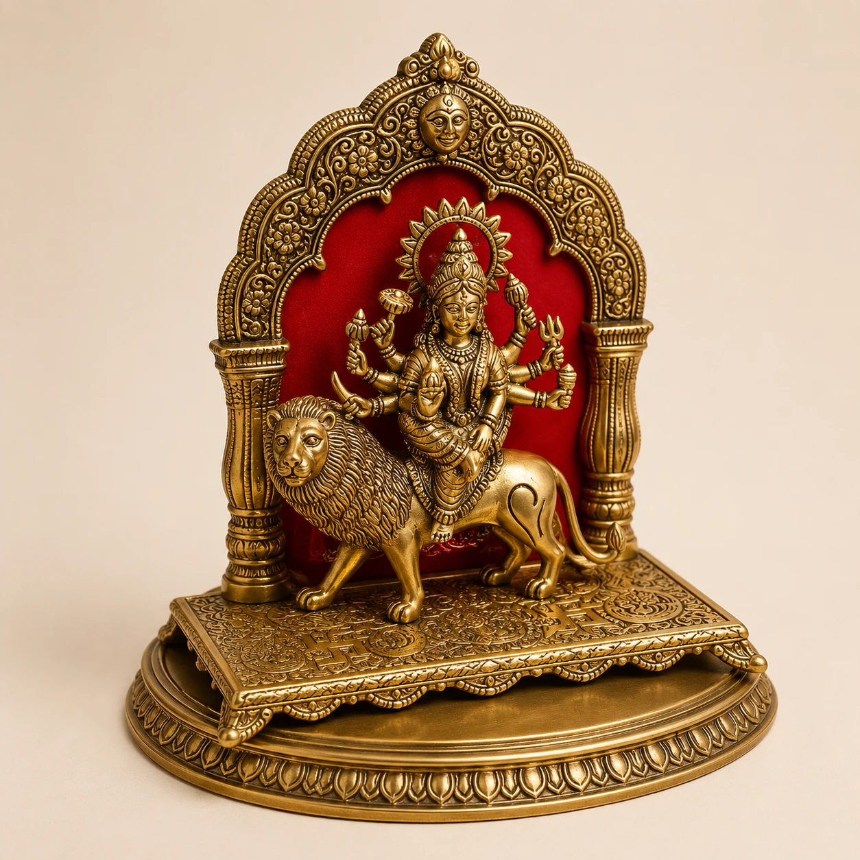 Close frontal product view highlighting the red velvet-style backdrop and detailed lion platform