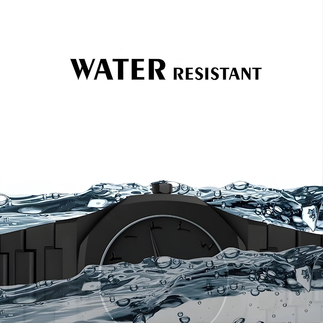 Black analog watch partially covered by water with Water Resistant text above