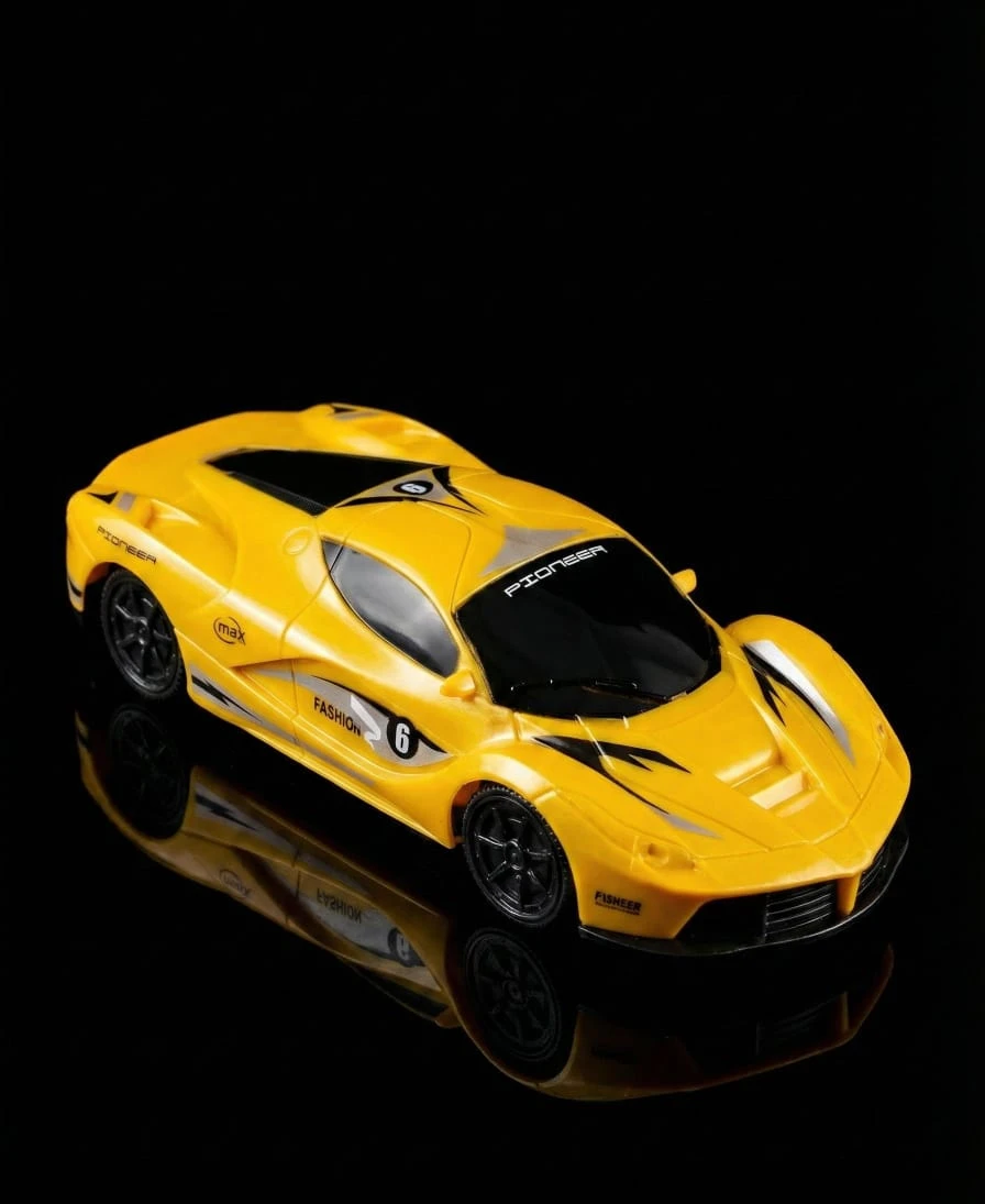 Yellow sports car toy in angled side-front view with black wheels and racing decals