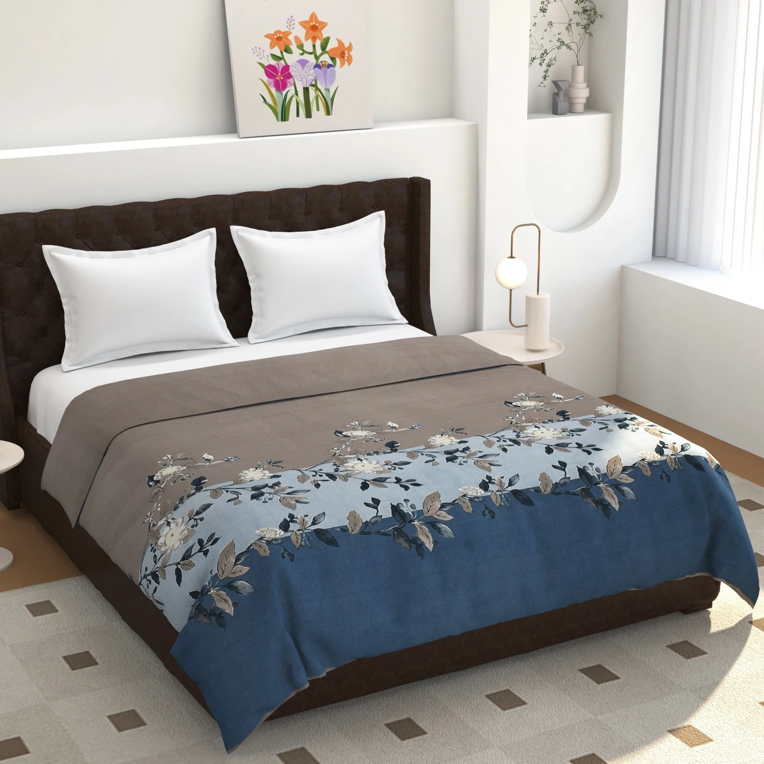 Blue and taupe floral printed bed blanket spread over a double bed in a styled bedroom