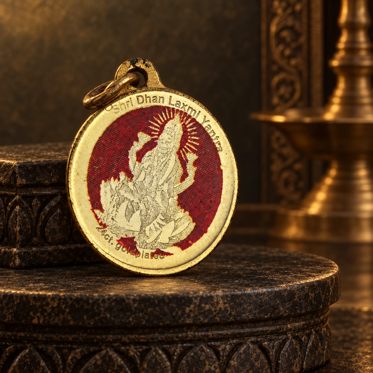 Front view of the pendant showing top loop ring and engraved Shri Dhan Laxmi Yantra text