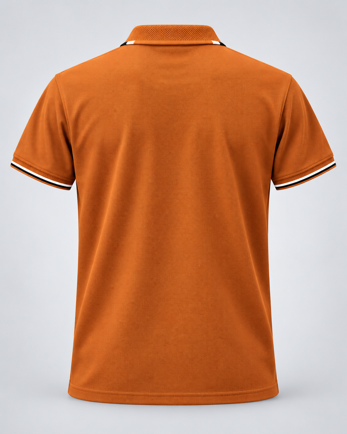 Back view of rust orange short-sleeve polo showing plain rear panel and tipped sleeve hems