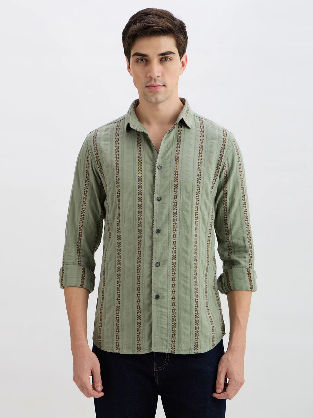 Front view of sage green shirt with vertical geometric stripes and rolled-up full sleeves