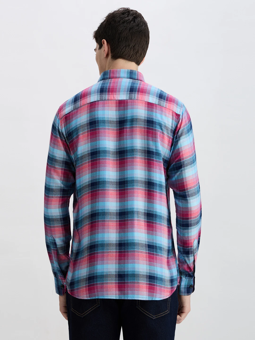 Back view of the blue, pink and navy plaid shirt with full pattern visible