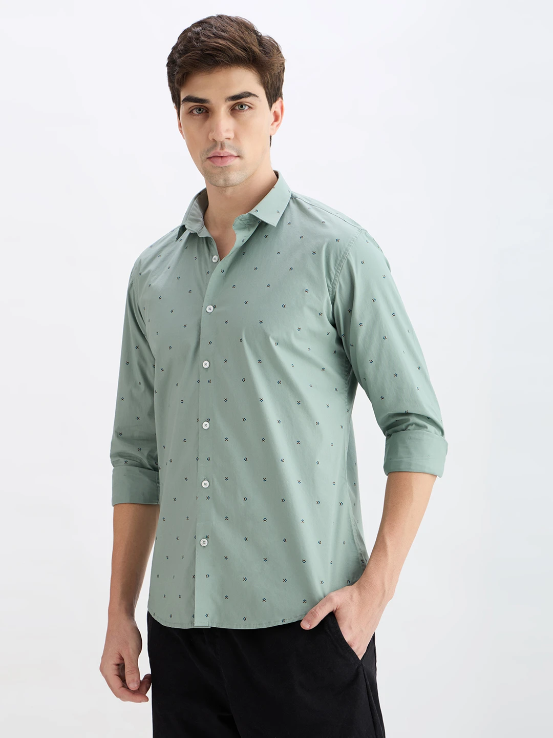 Three-quarter front angle showing the subtle all-over micro print and spread collar