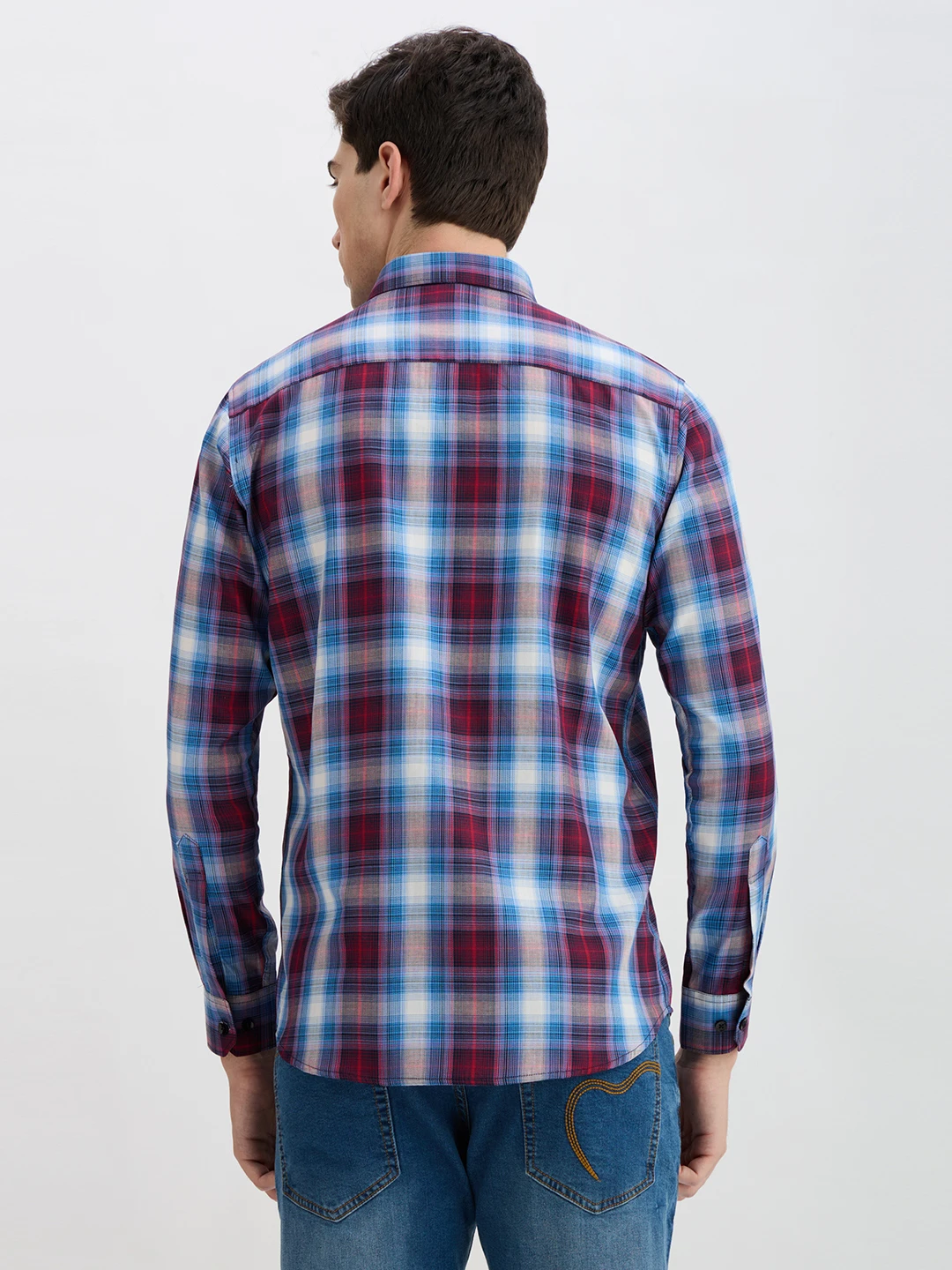 Back view of the shirt showing the full check pattern and rear yoke