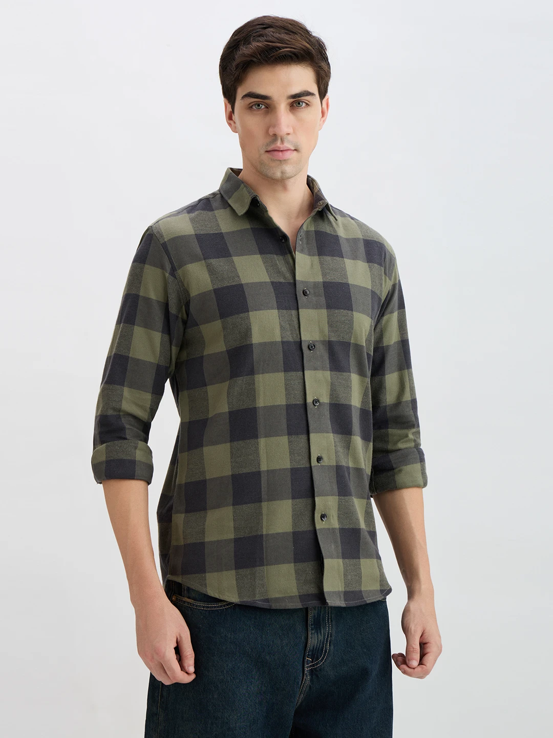 Three-quarter right view of the plaid shirt with spread collar and dark buttons visible