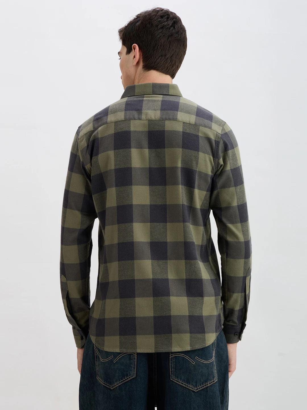 Back view of the olive and charcoal checked shirt showing yoke and full-sleeve design