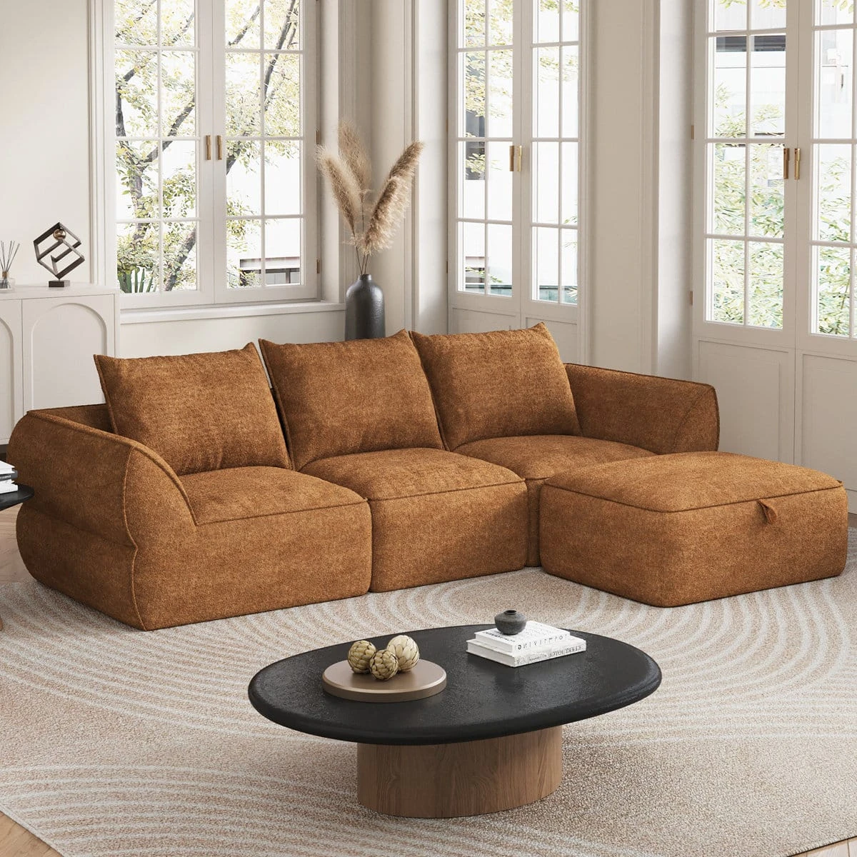 Reverse angle showing the 3-seat modular sofa with ottoman arranged as a left chaise