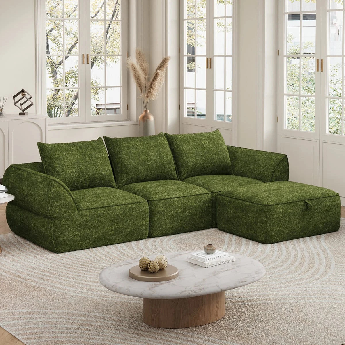 Angled front-left view showing the sectional layout and movable ottoman