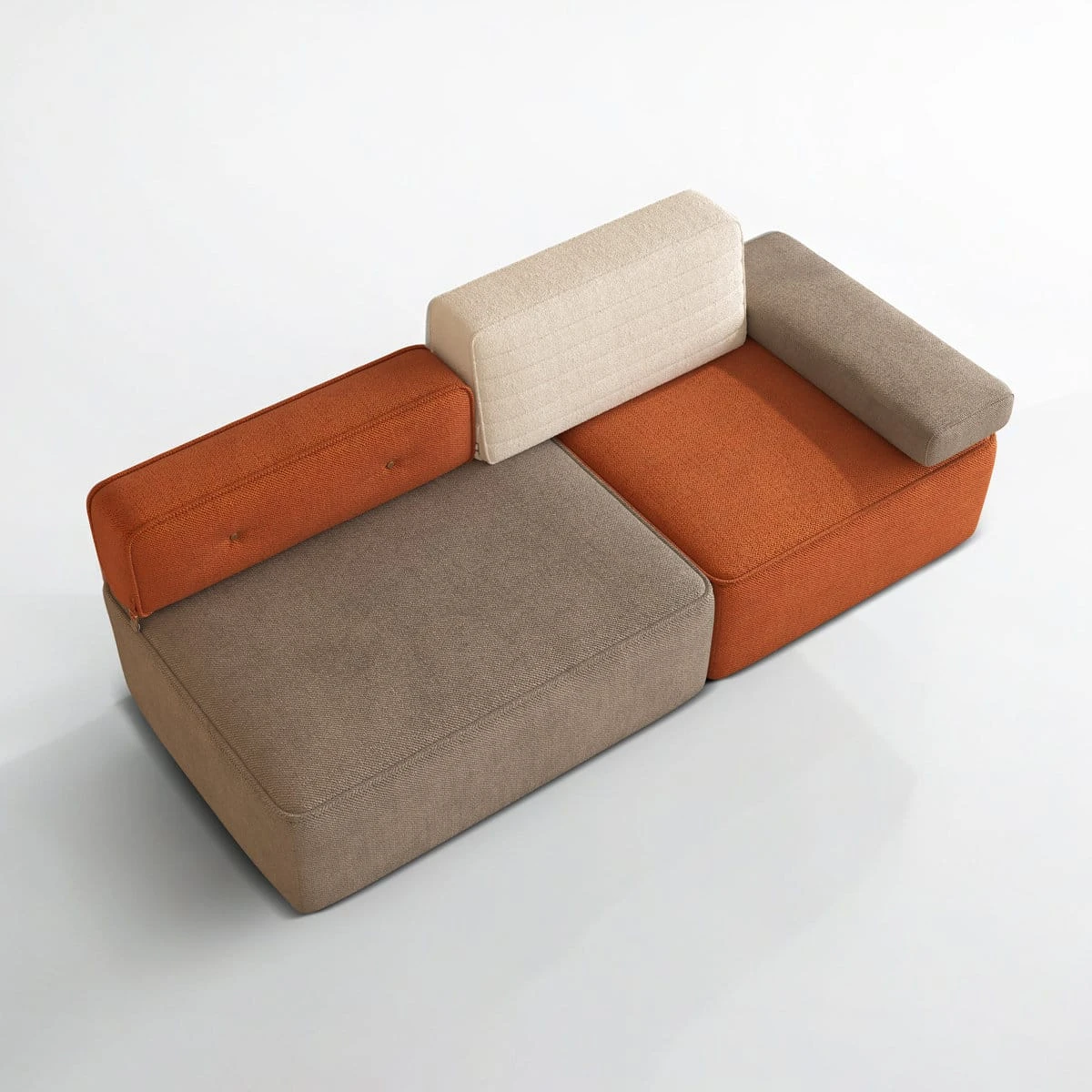 Top angled view highlighting the two seat cushions, orange side bolster and gray armrest