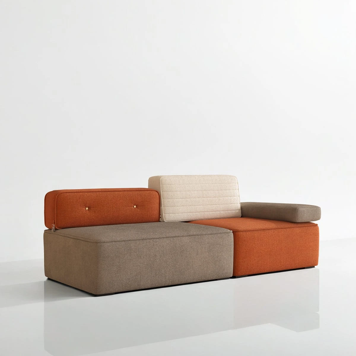 Straight front view of the modular sofa with tufted orange backrest and cream stitched back cushion