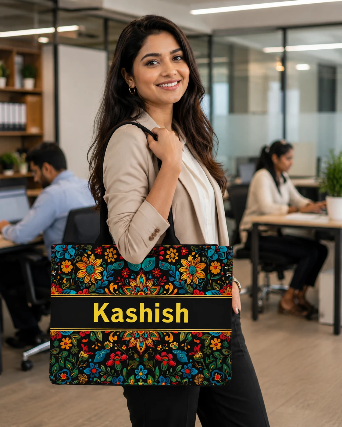 Woman carrying the personalized floral tote in an office, showing scale and shoulder straps