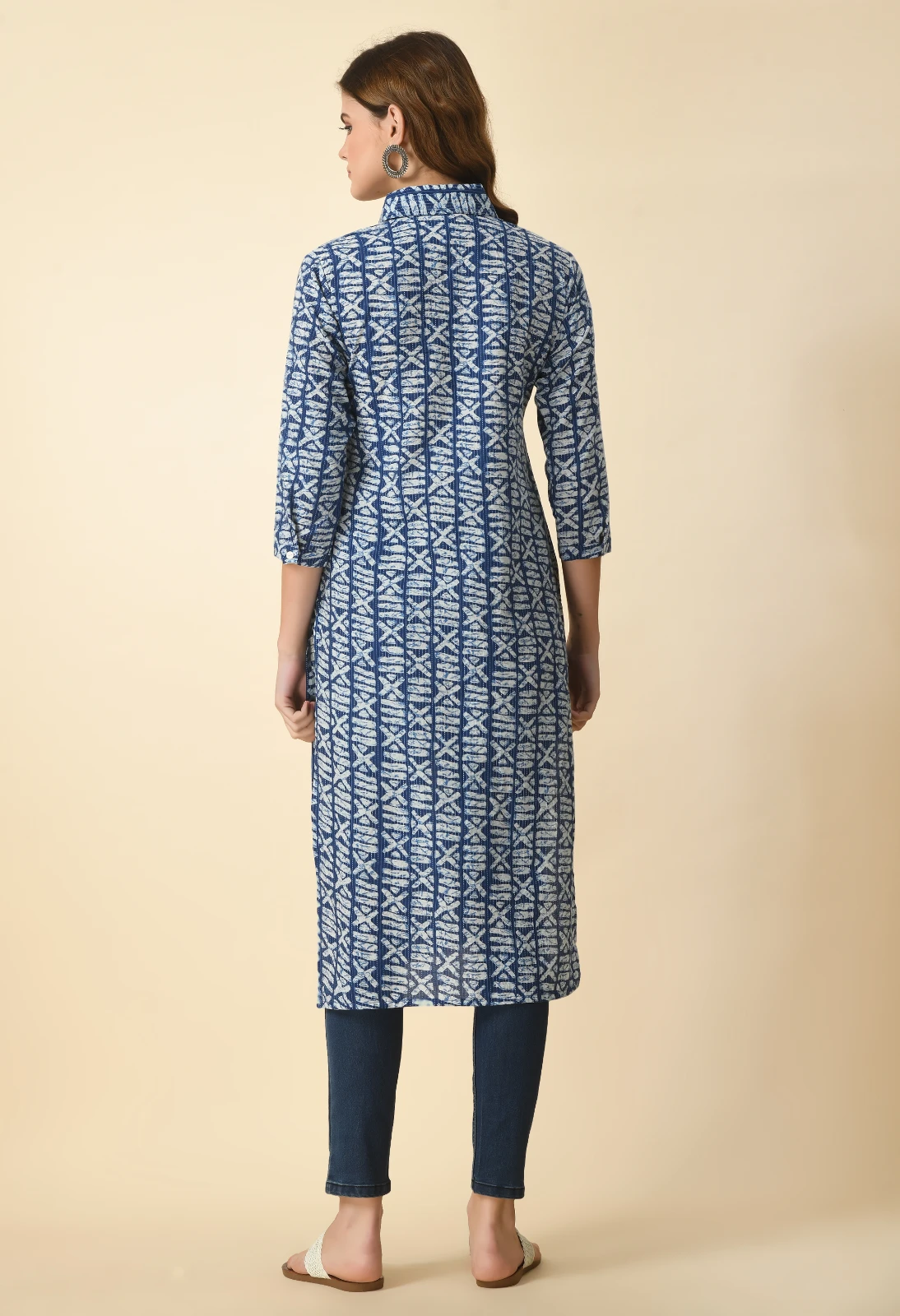 Back view of blue and white printed long kurta showing collared neckline and straight 3/4 sleeves