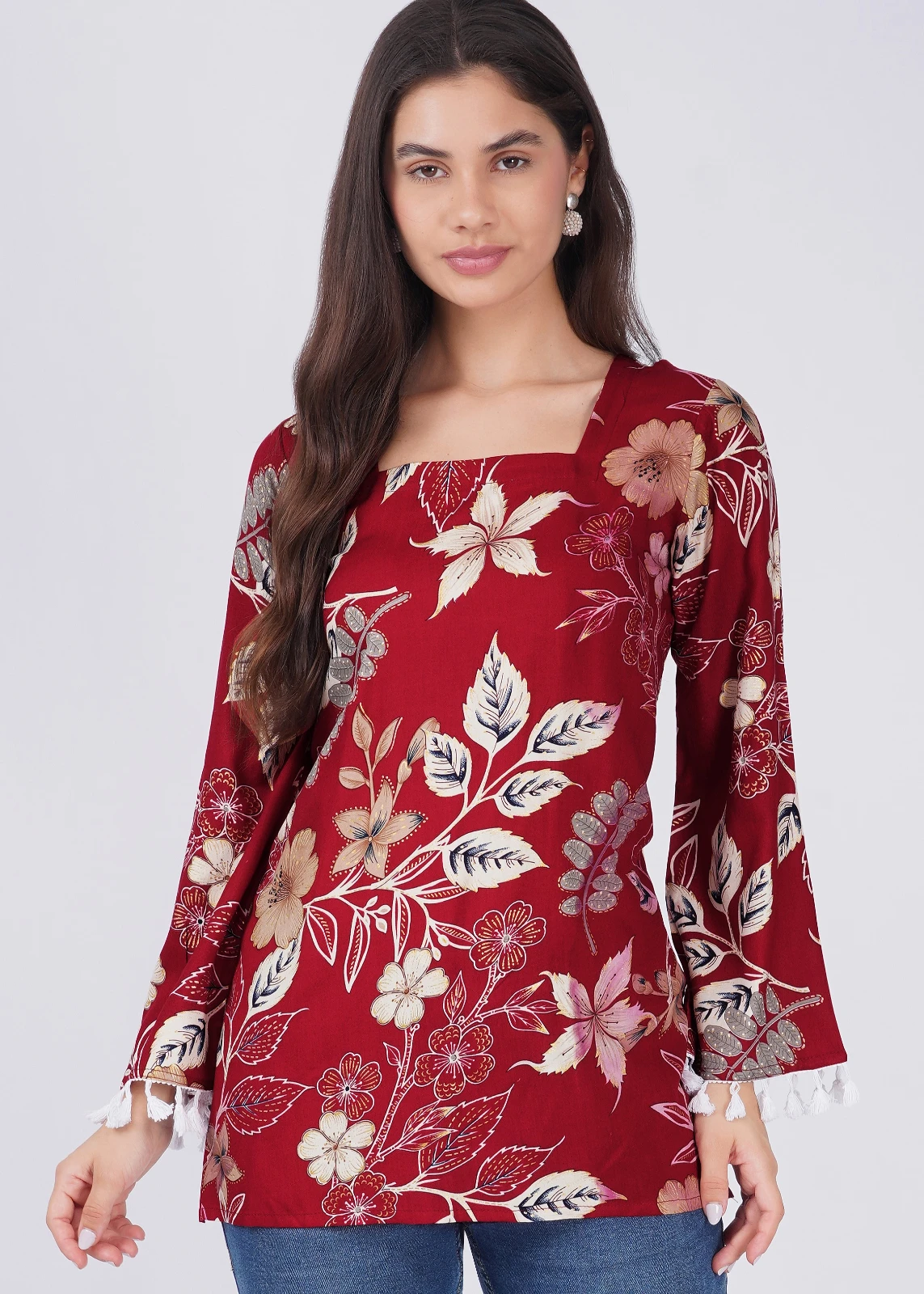 Straight front portrait of the floral top showing the full print and sleeve shape