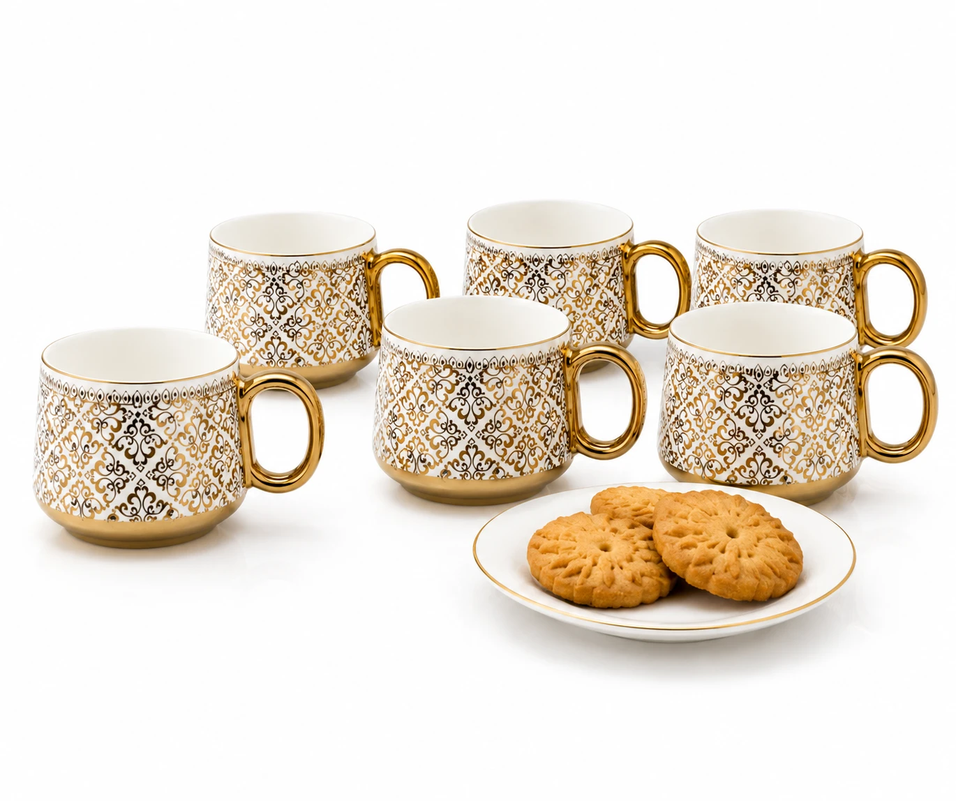 Six matching gold-patterned mugs on a white background with a small plate of biscuits in front