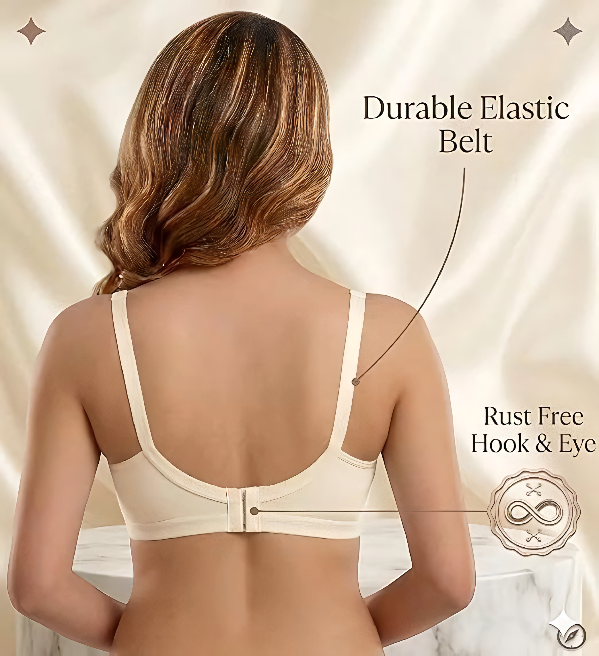 Back view of the beige bra showing hook-and-eye closure and wide elastic underband