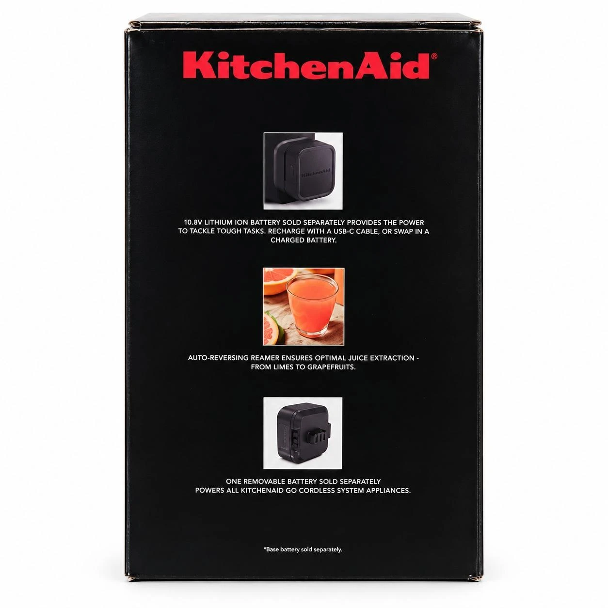 Side panel of KitchenAid Go juicer box with battery compatibility and auto-reversing reamer feature callouts
