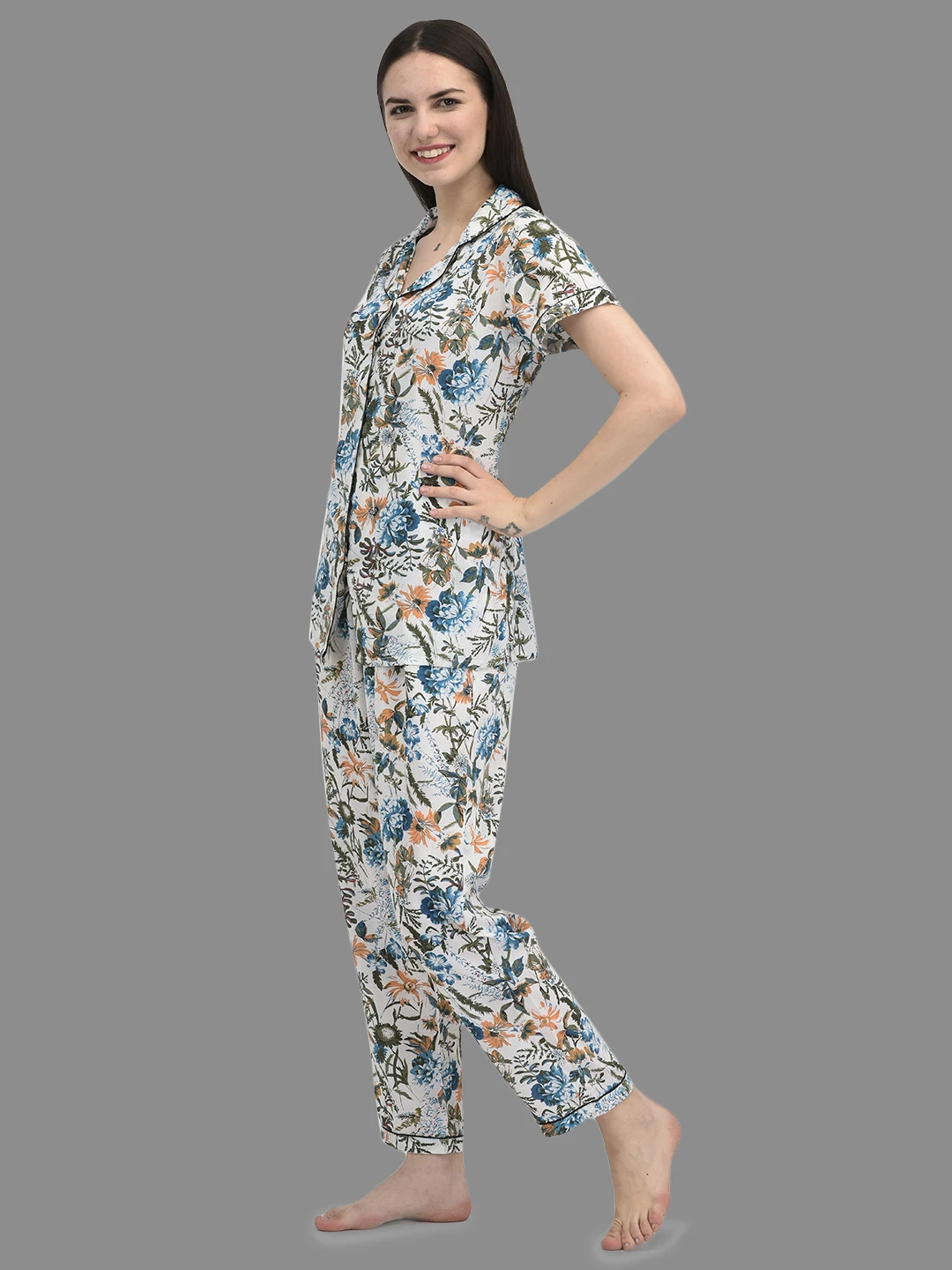 Left side profile of the floral sleepwear set with contrast piping and relaxed straight-leg trousers
