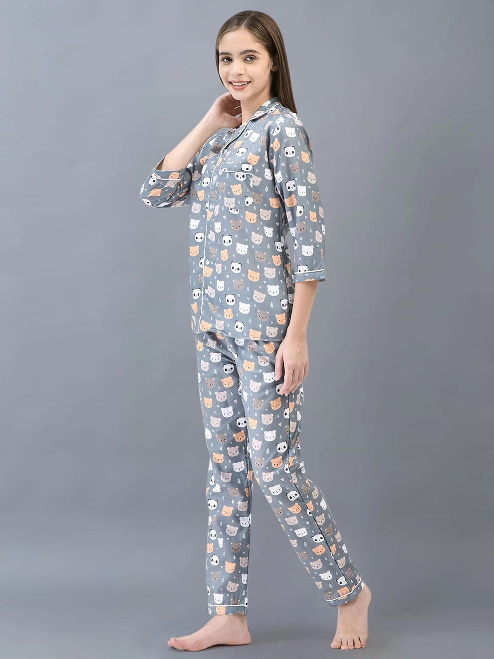 Side angle of the printed night suit with chest pocket, contrast piping and cropped sleeves