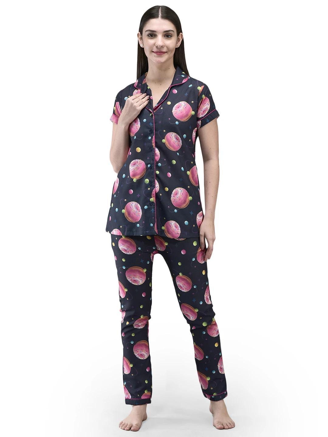 Front view of navy pajama set with pink donut print, short-sleeve button shirt and full-length pants