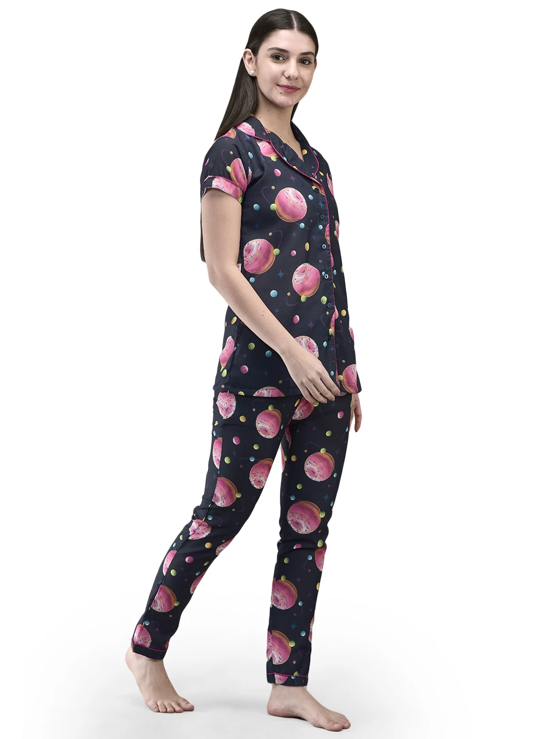 Right side pose of the navy sleep set with pink piping on sleeves, placket and pant hems